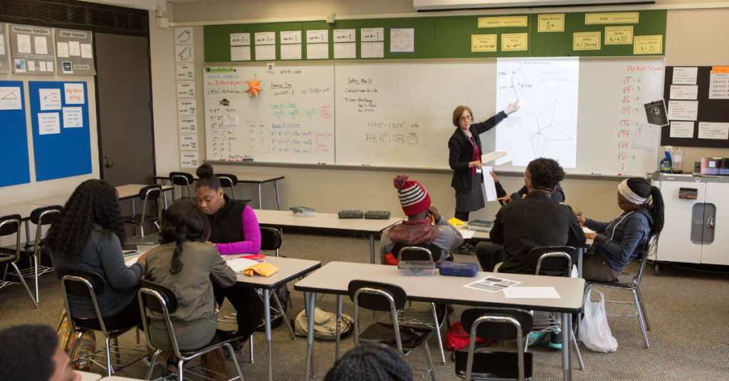 Teacher at the chalk board (educational research).