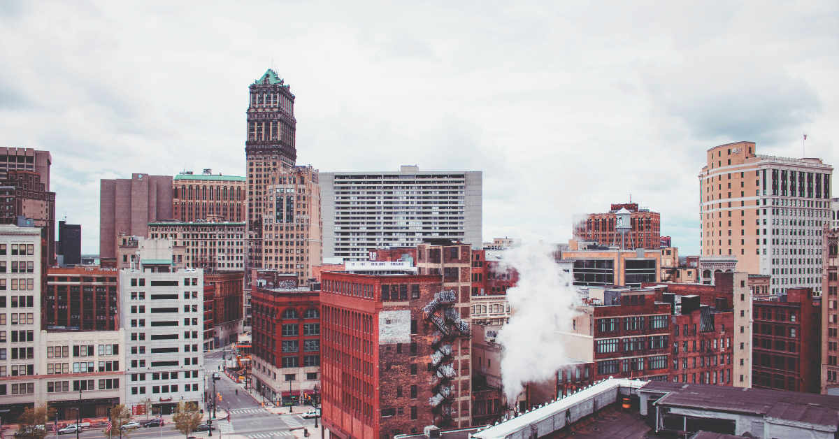 A view of a city skyline. Photo by Doug Zuba on Unsplash