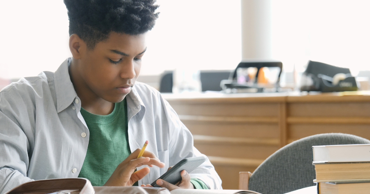 High school student using calculator